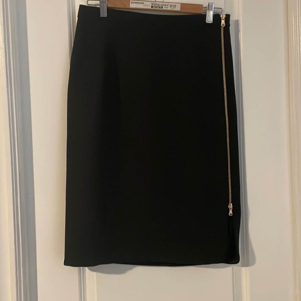 J. Crew women’s wool knee length skirt, side gold zipper. Size 6. Black.